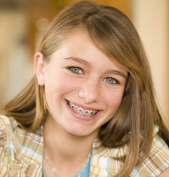 a girl wearing braces
